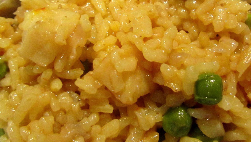 Arròs de bacallà, pèsols i carxofa